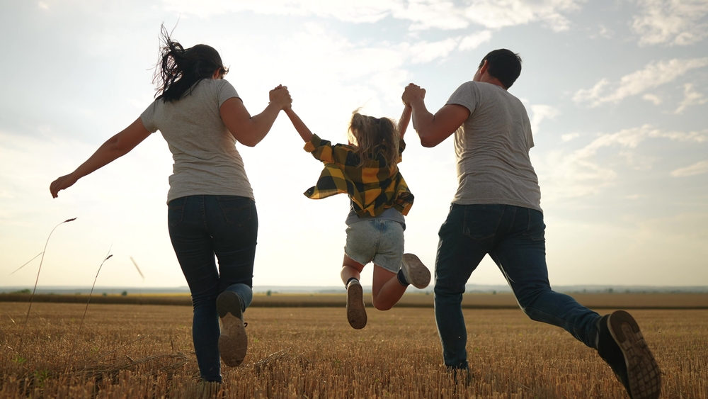 Happy,Family.,Father,Mother,And,Daughter,Together,Run,Throw,Up